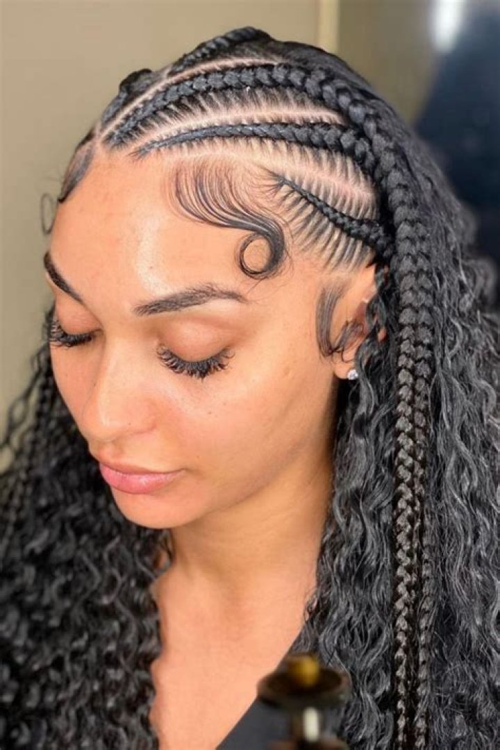 Dive Into The World Of Middle Part Tribal Braids With Curls